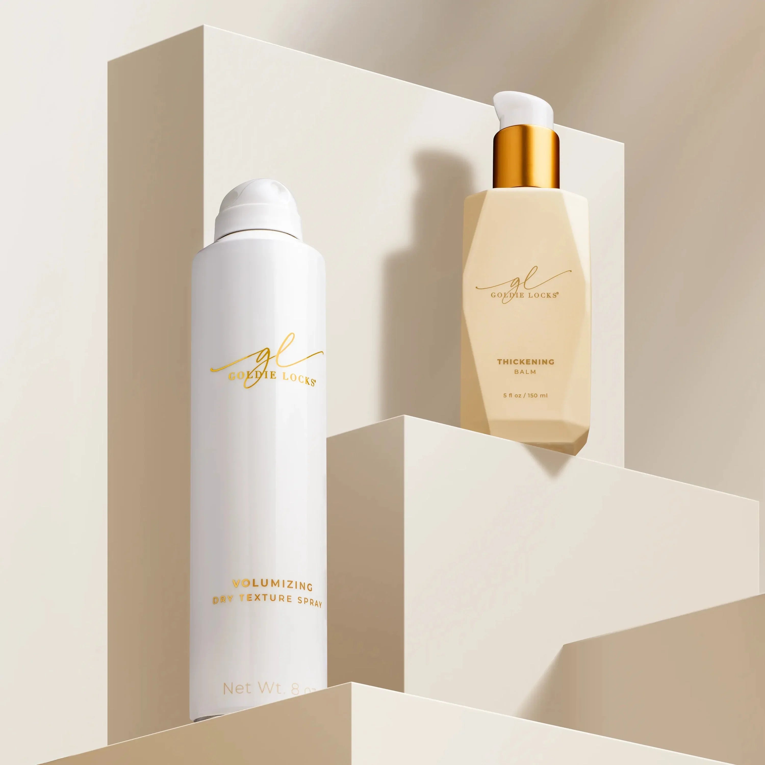 Goldie Locks Volumizing Dry Texture Spray and Thickening Balm hair care products display