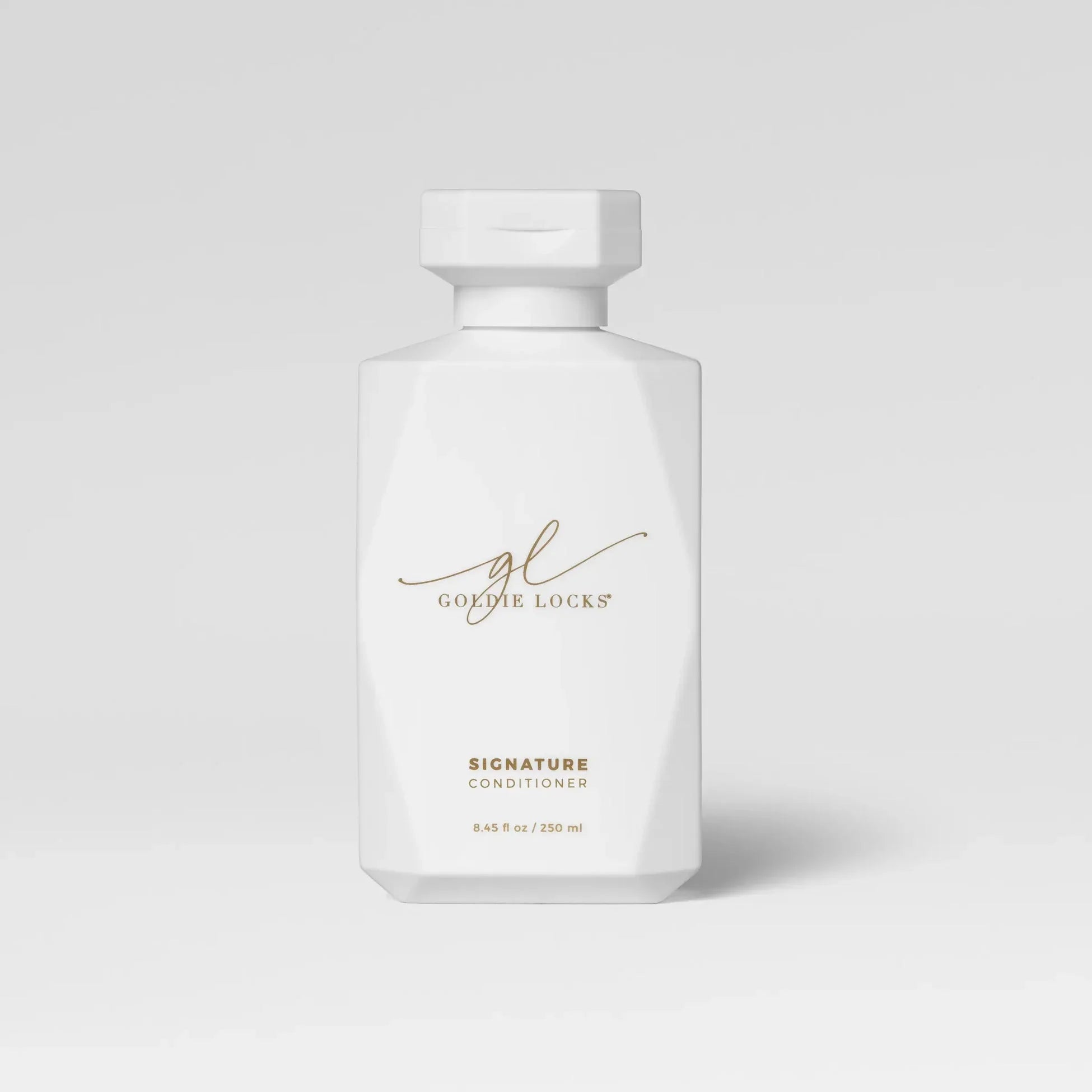 Goldie Locks Signature Conditioner bottle for hair extensions care, Delray Beach FL luxury studio