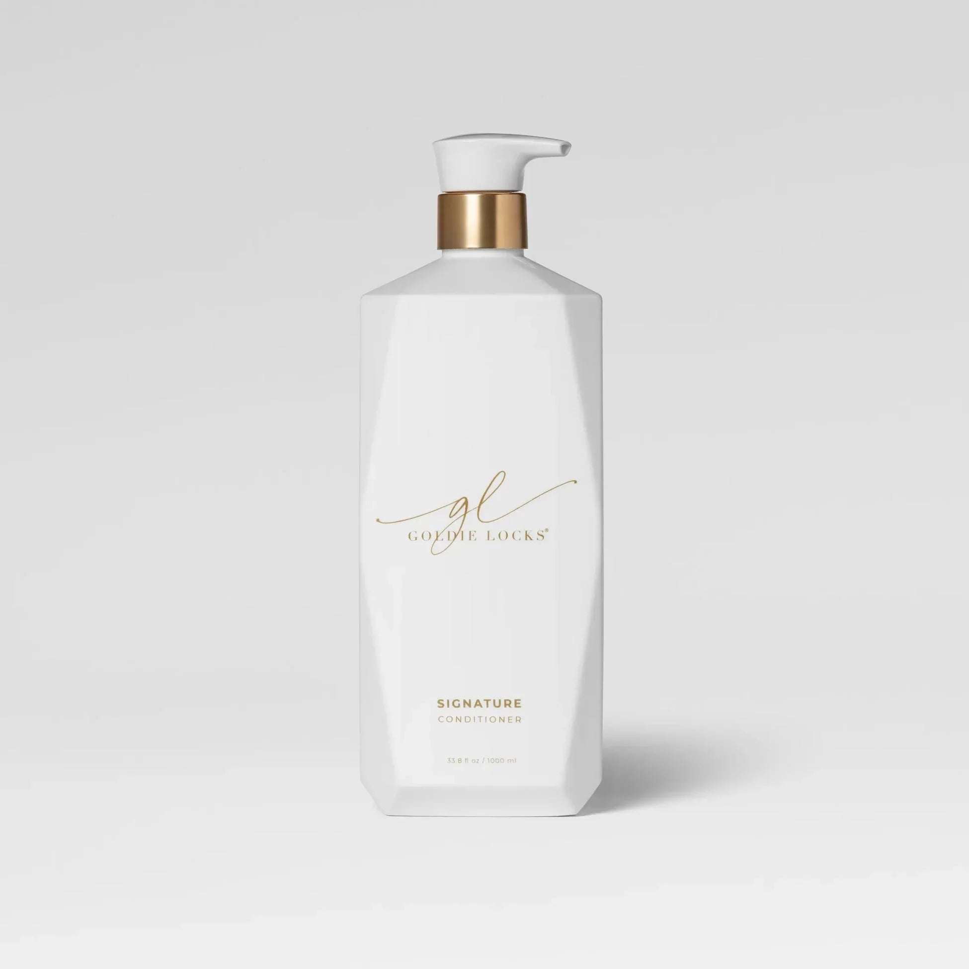 Goldie Locks Signature Conditioner bottle for hair extensions and blonding care in Delray Beach FL