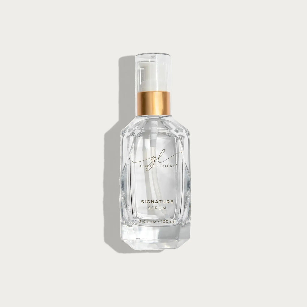Clear hair serum bottle for hair extensions and blonding, Delray Beach FL, on white background.
