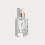 Clear hair serum bottle for hair extensions and blonding, Delray Beach FL, on white background.
