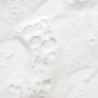 Close-up of rich foamy shampoo lather, ideal for hair extensions care in Delray Beach FL