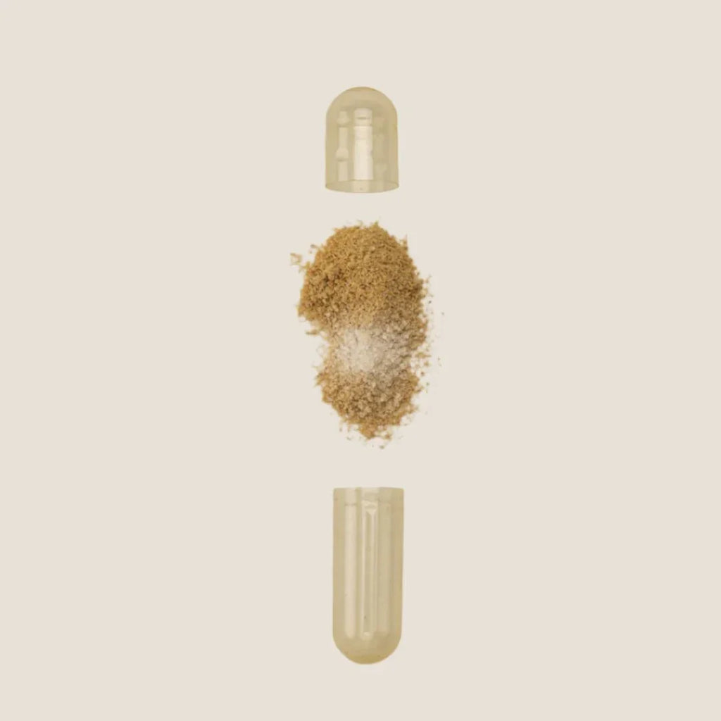 Opened hair supplement capsule with powder, hair care product for extensions in Delray Beach FL
